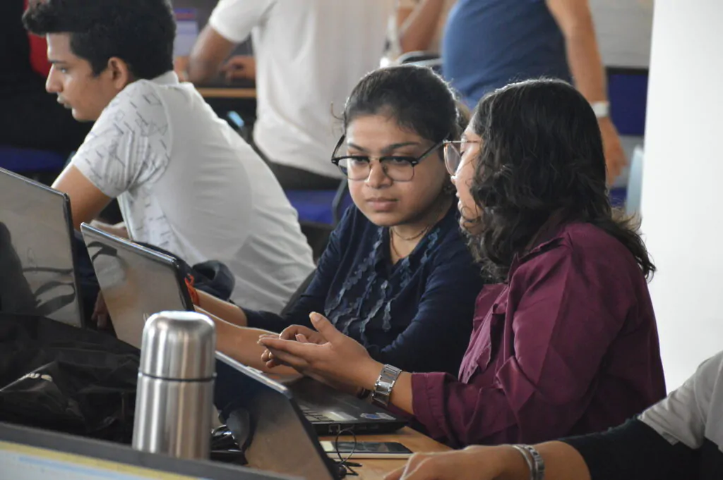 two women interacting in incubator office